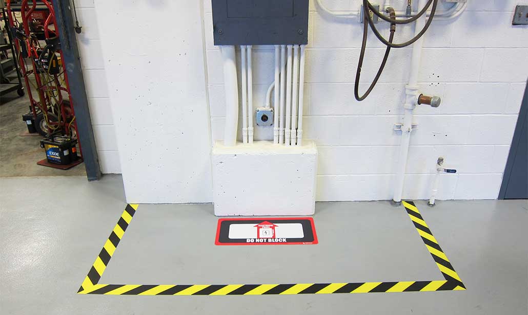 Tape measure showing 36 inches clearance in front of panel