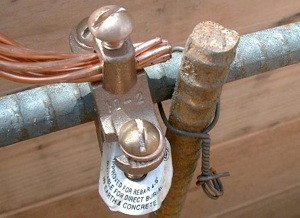 Bonded rebar clamp